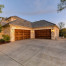 house with two brown garage doors