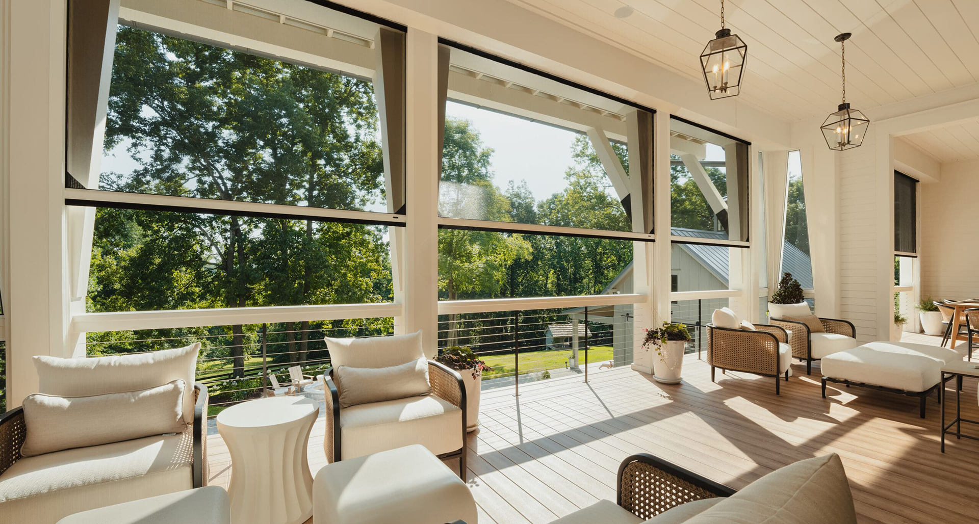 Large retractable patio screens enclosing a spacious outdoor living patio