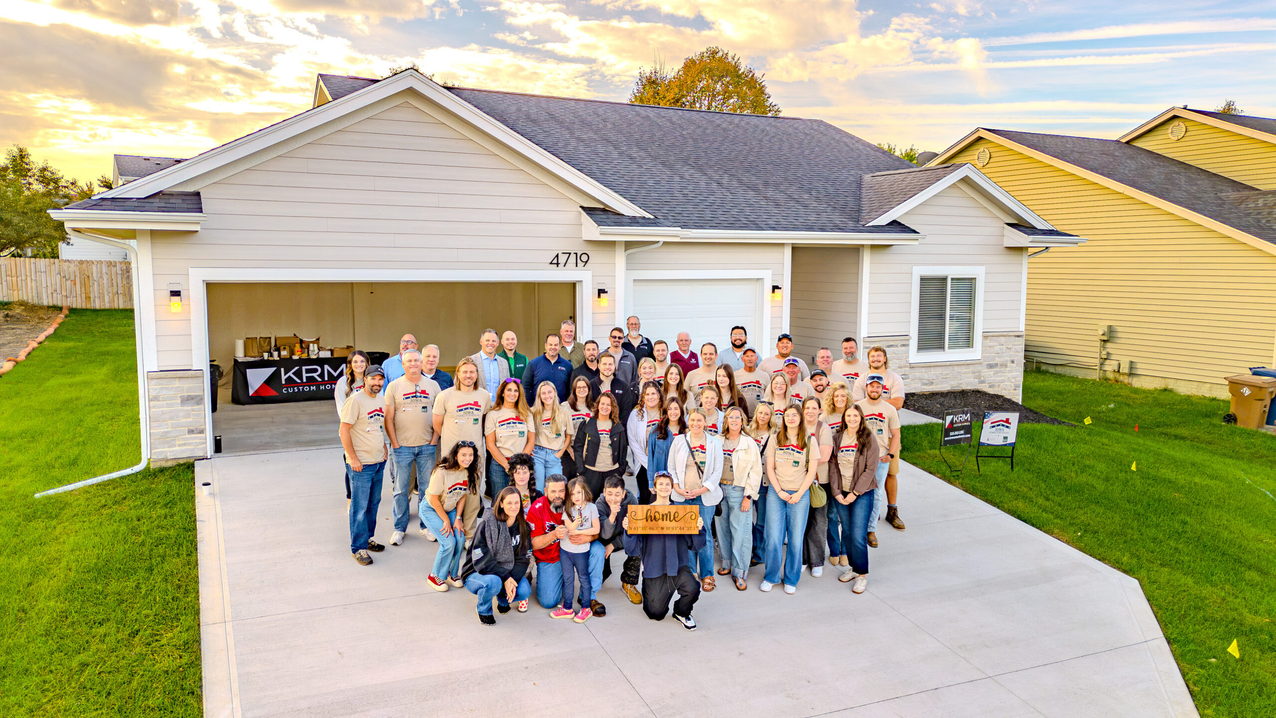 Donating Garage Door - Group Picture with all people who helped build the home for veteran